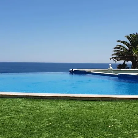 Breathtaking With Infinity Pool Over The Sea Praia Da Luz